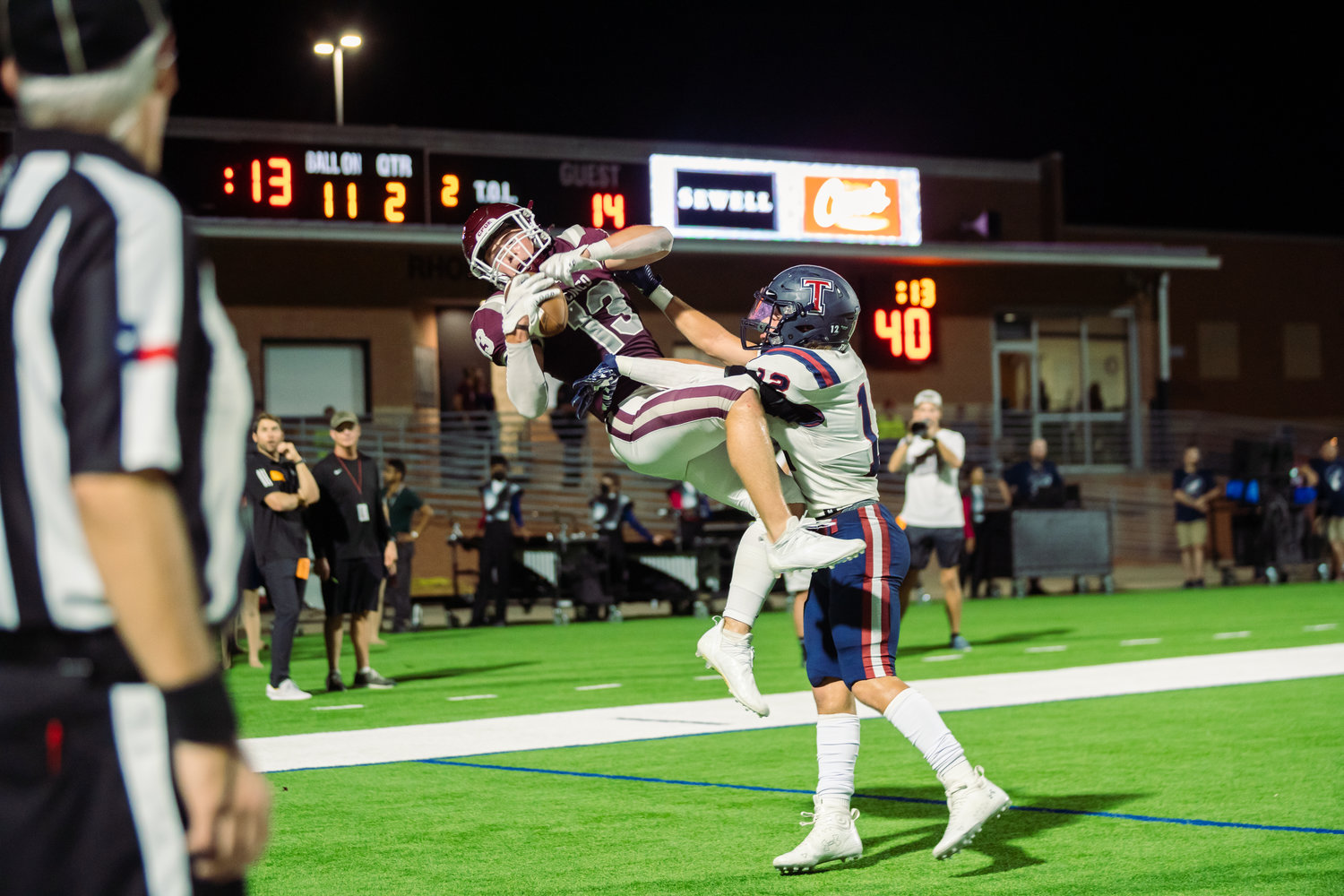 Cinco Ranch’s Fischer Reed catches a touchdown during Friday’s game between Cinco Ranch and Tompkins at Rhodes Stadium.